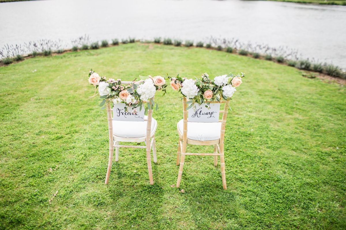 A garden celebration table arranged with flowers and place settings